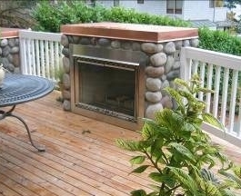 Composite wood deck designed by Kirkland Landscape Company, Environmental Construction