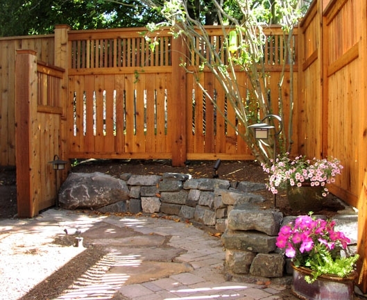 Custom fencing by landscaper Environmental Construction