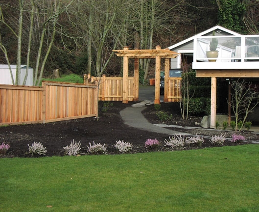 Backyard privacy fence built by landscape company, Environmental Construction