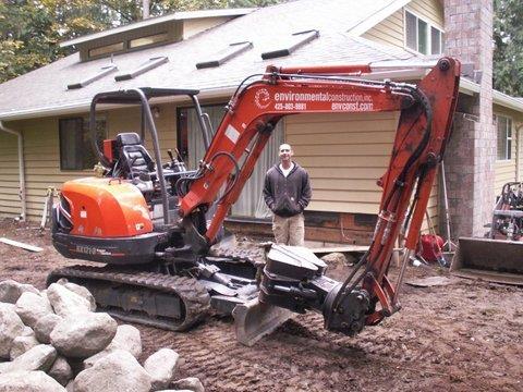 Trackhoe used by Environmental Construction landscape company