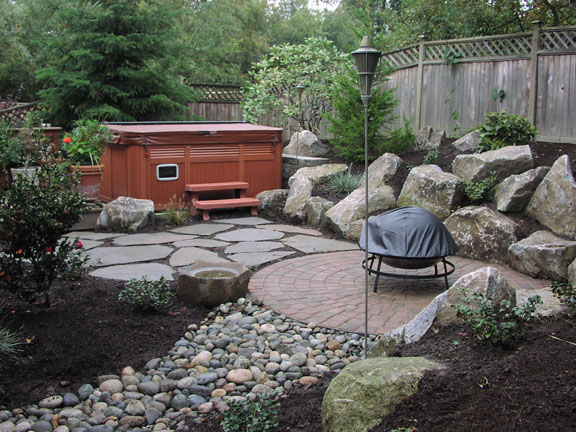 Hillside around home in Bellevue is remodelled by Landscaper in Seattle 