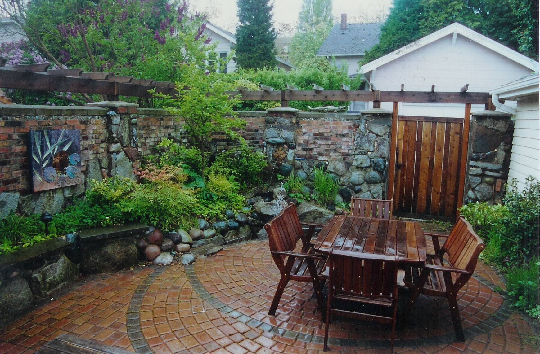 Brick and stone wall designed by Environmental Construction Inc. in Kirkland WA