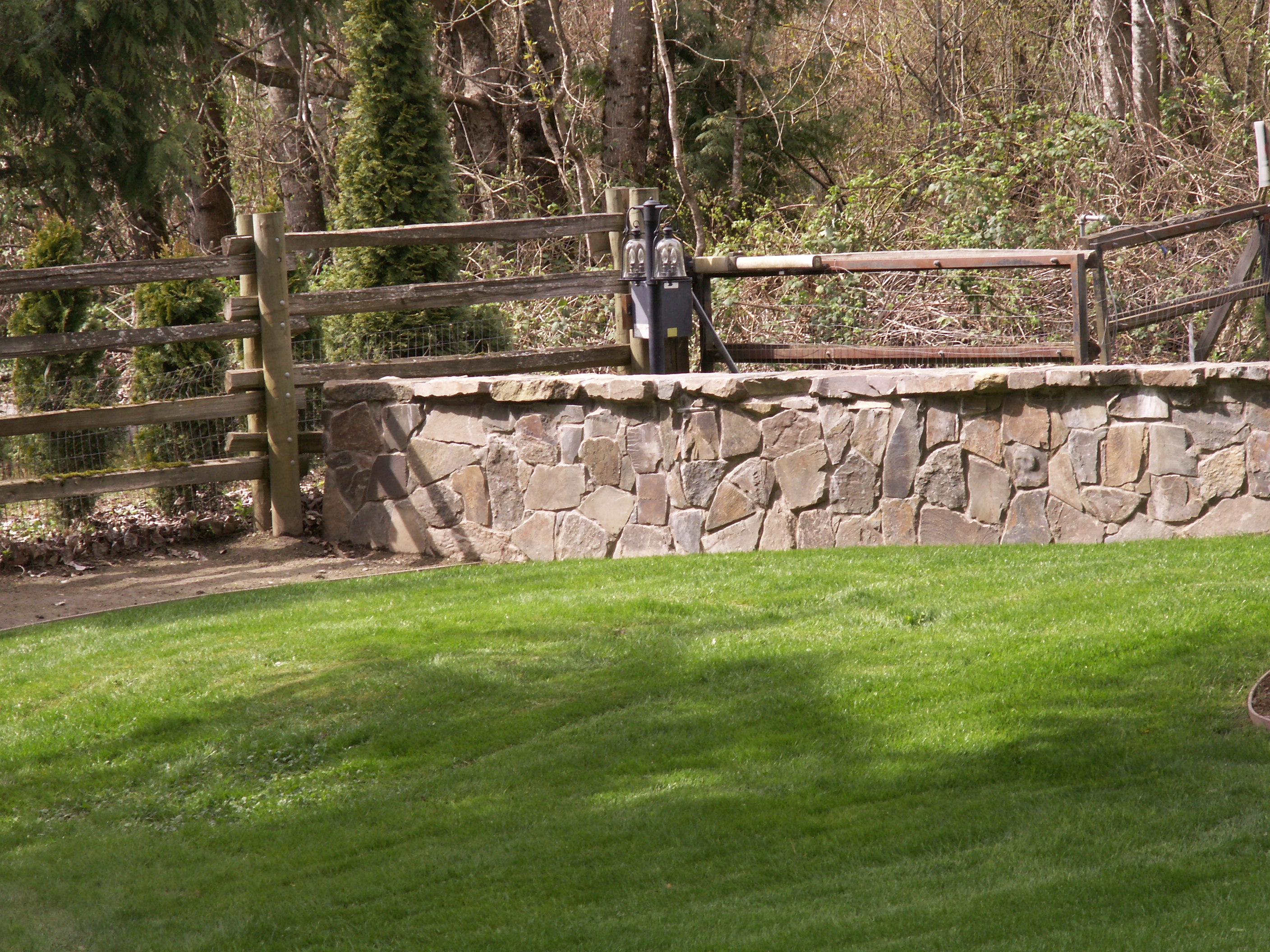 Cemented stone wall designed by Environmental Construction Inc. in Kirkland WA