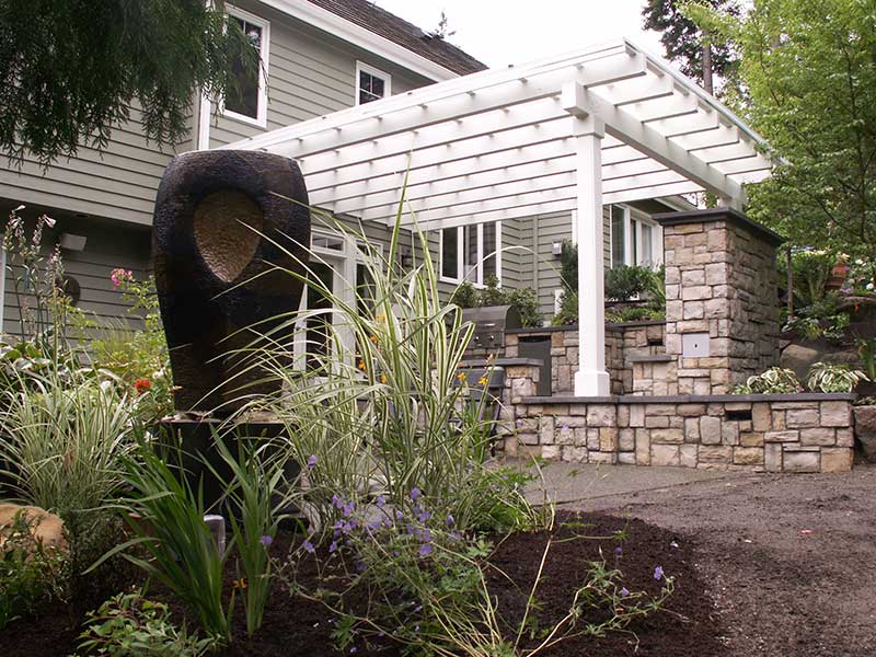Outdoor kitchen design includes a quality-built pergola